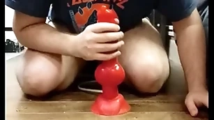 I conduct oneself close to my huge dilto and i cum with respect to my chastity cage