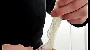 Action with habituated cumfilled condom from stranger