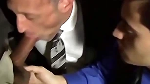 Bald unshaven pencil sucking several cocks in an orgy